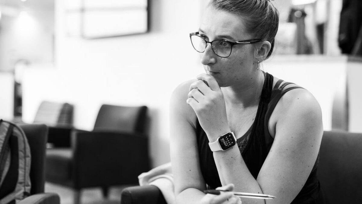 thinking woman in a classroom