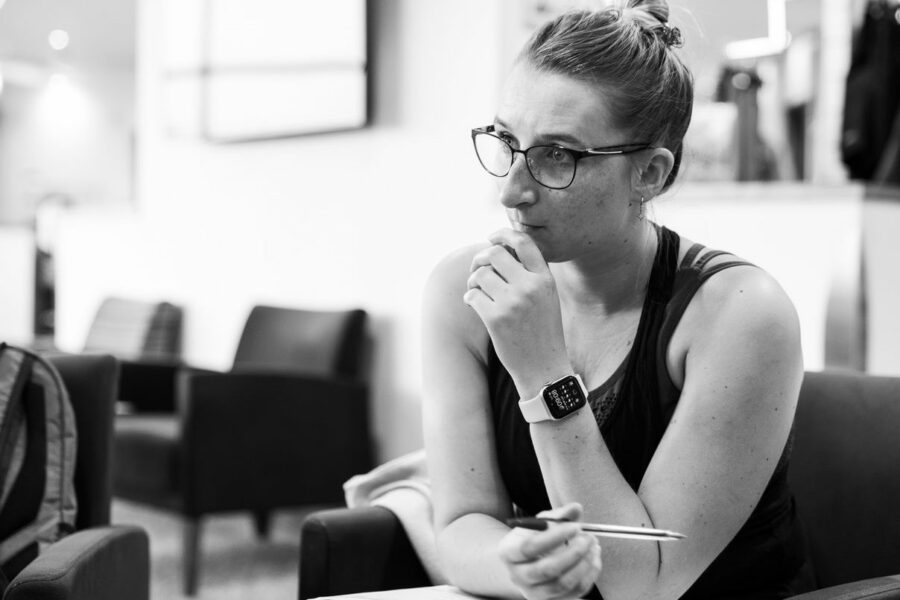 thinking woman in a classroom